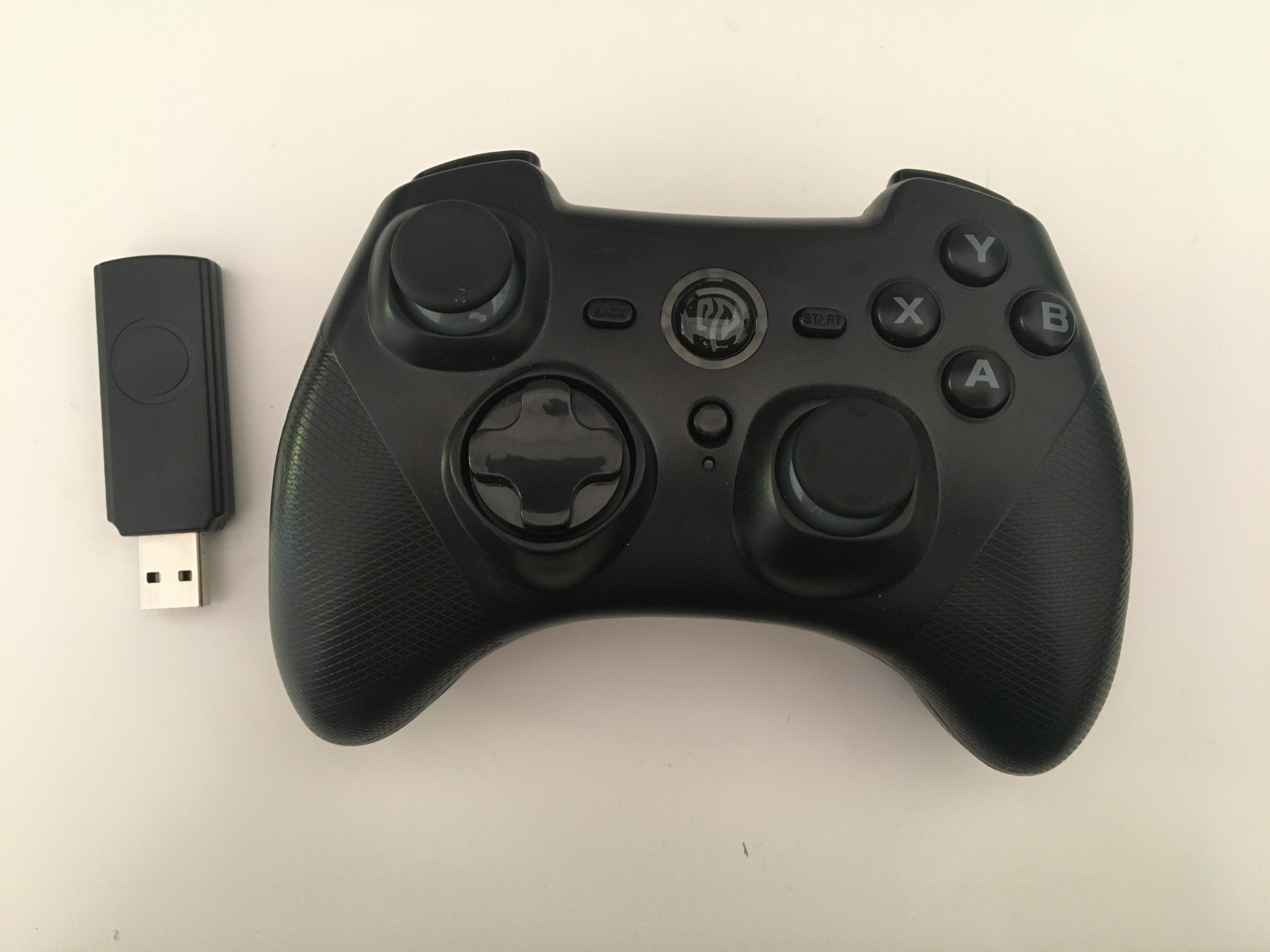 EasySMX gamepad with USB receiver on the left